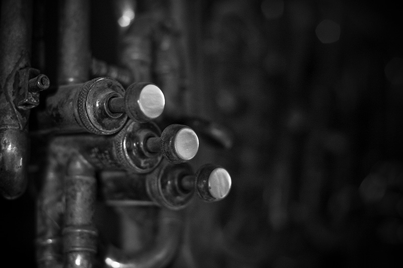 The three keys of a brass instrument.