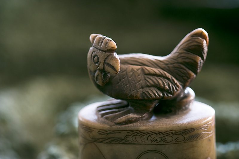 A carved rooster.