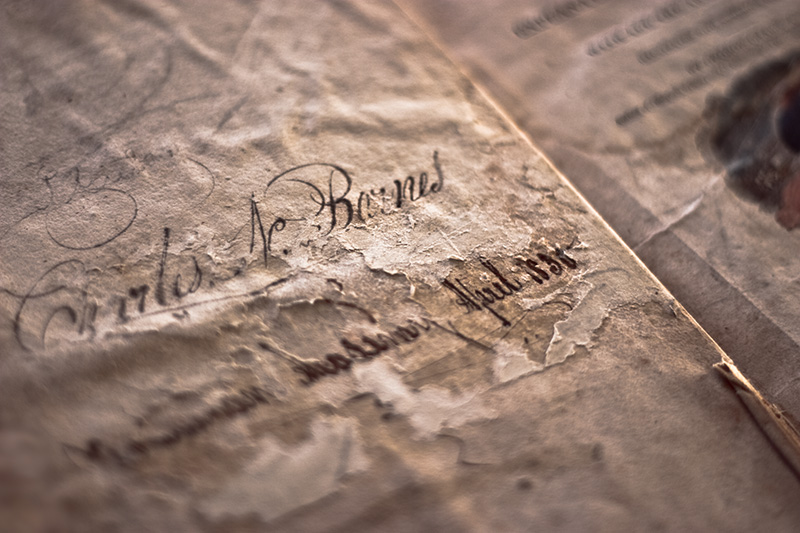 A signature inside the cover of a 150-year-old book.