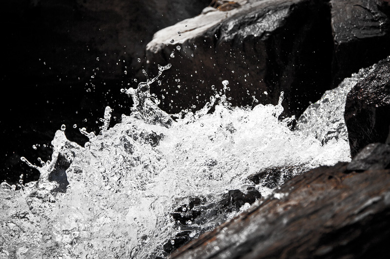 Water splashing as it cascades down a mini waterfall in the North Fork of Cave Creek in the Chiricahua Mountains.