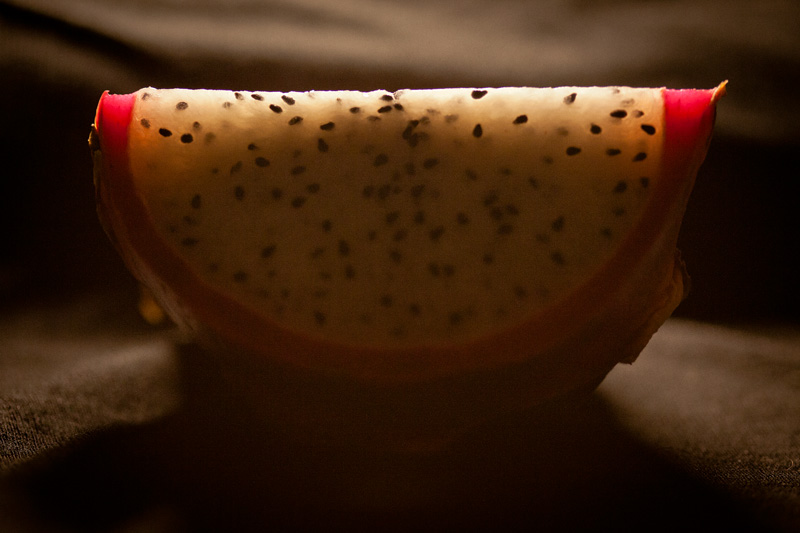 A wedge of backlit dragonfruit.