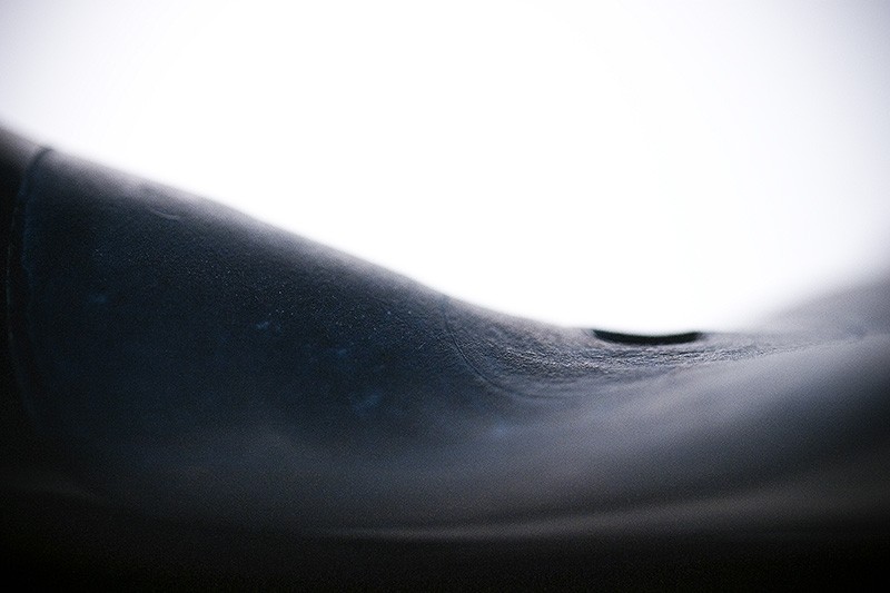 The center of a heat-distorted vinyl record.
