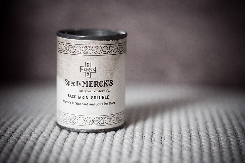 An old can with a paper label.