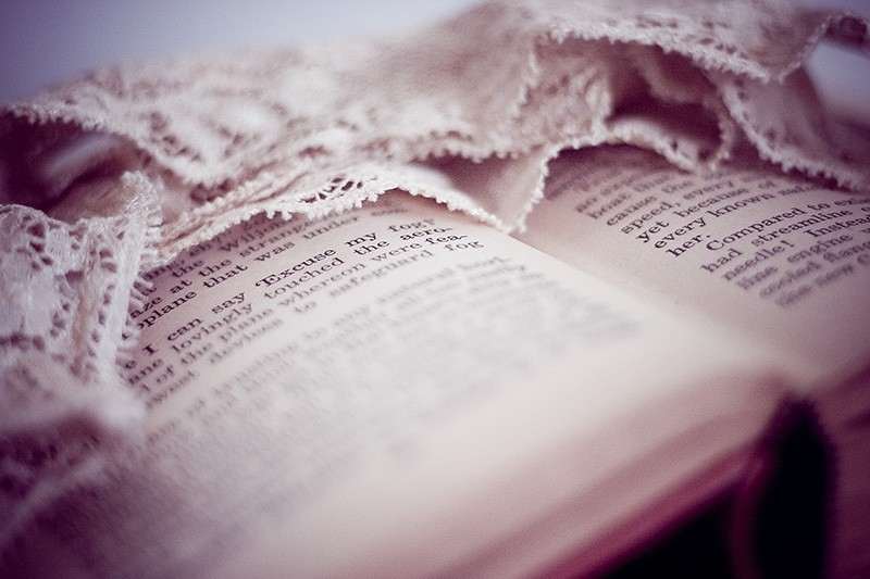 Lace draped across a book.