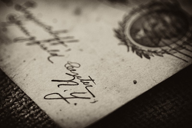 A detail view of an antique postcard.