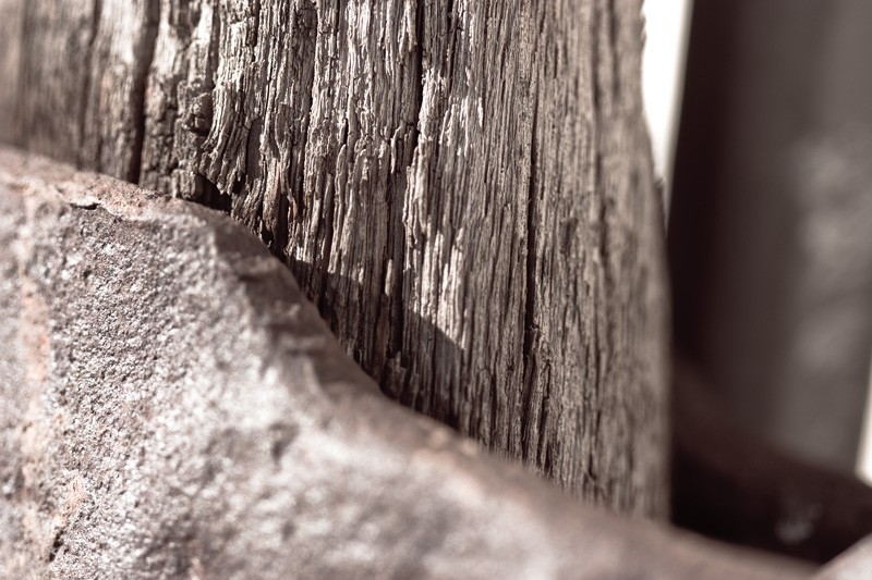 Old, weathered wood and metal.
