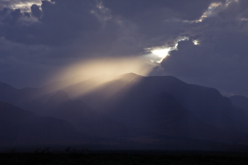 Light streaming through the clouds during a rainstorm.