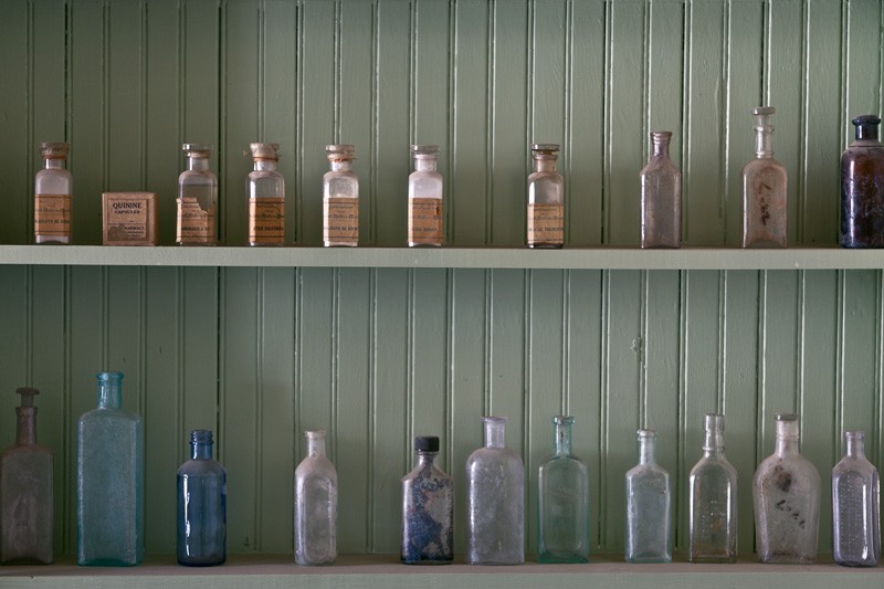 Shelves of empty bottles.