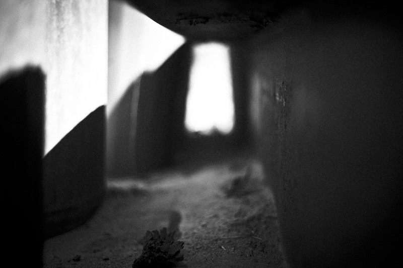 An abstract view of buckets and an I-beam.