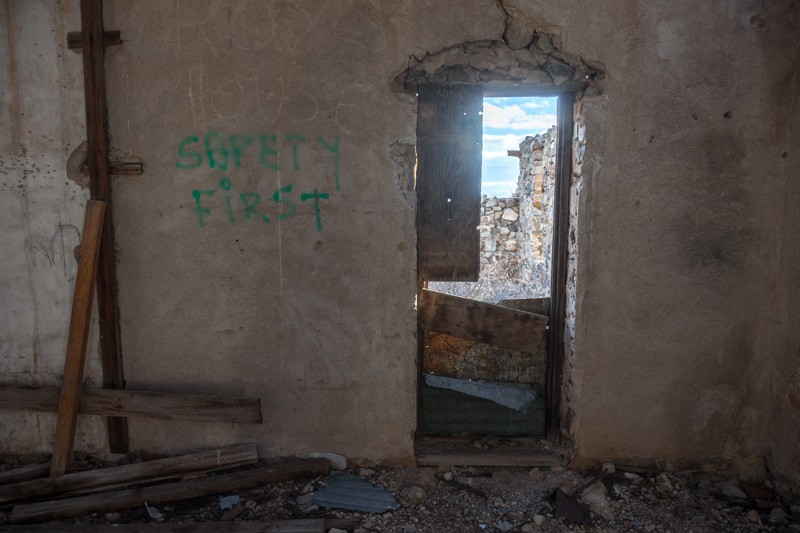 A grafitti-covered wall in an abandoned building at the Johnny Bull Mine.