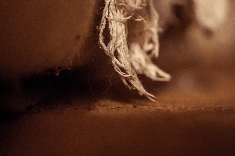 The tassled edge of a piece of fabric.